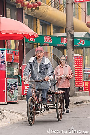 Chinese elderly on the street in Zhuozhou, Hebei Province, China Editorial Stock Photo
